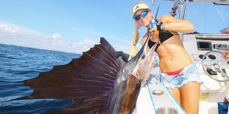 Girl catches a GIANT FISH taller then her deep sea fishing!