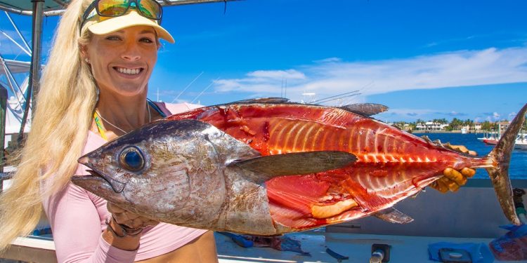 Girl Shows How To Fillet Big Blackfin Tuna