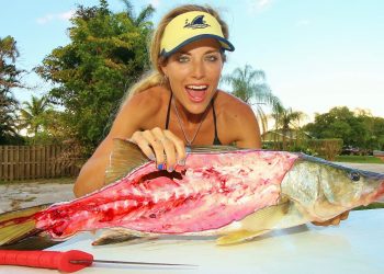 Knife Wielding Girl Cuts Open a Snook