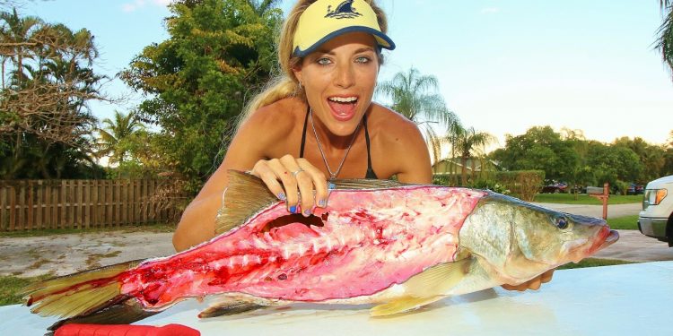 Knife Wielding Girl Cuts Open a Snook
