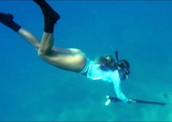 Girl Spearfishing and Diving in Florida Keys